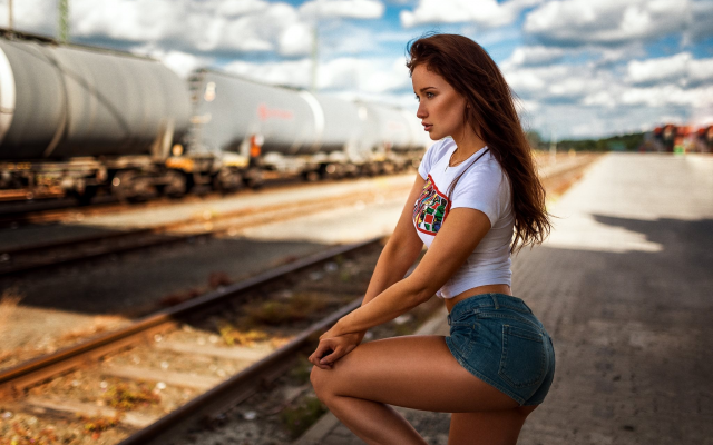 2048x1367 pix. Wallpaper women, model, long hair, auburn hair, jeans shorts, sexy ass, legs, tanned, train station, railway, rails
