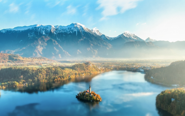 2500x1408 pix. Wallpaper slovenia, lake bled, mountains, lake, haze, island, church, nature