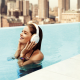 Doutzen Kroes, women, swimming pool, smiling, headphones wallpaper