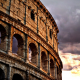 colosseum, rome, italy, dark clouds, city, sunset wallpaper