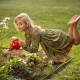 child, girl, smiling, dress, levitation, nature, summer, flowerbed, flowers, chamomile, watering can wallpaper