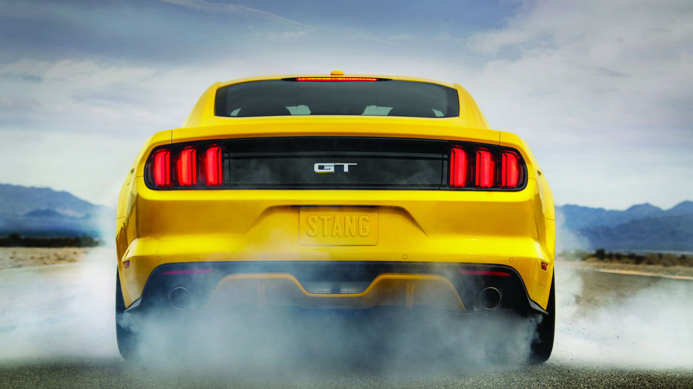 Download 1366x768 ford mustang v8 gt, ford mustang gt, ford mustang, ford,  cars, yellow car Wallpapers