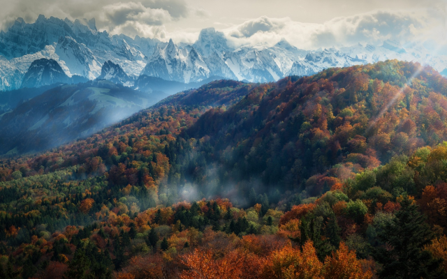 2000x1250 pix. Wallpaper mountains, forest, fall, mist, trees, nature, landscape, Alps, snowy peak, clouds, sun rays, morning