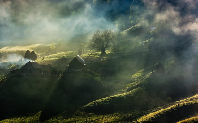 2700x1688 pix. Wallpaper fairy tale, mist, sunrise, village, trees, grass, house, fence, hill, Romania, nature, landscape
