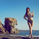 women, model, jean shorts, rock, sand, sea wallpaper