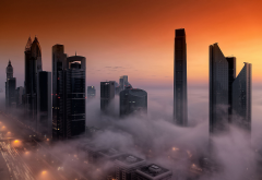 dubai, city, skyscrapers, fog, clouds wallpaper
