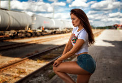 women, model, long hair, auburn hair, jeans shorts, sexy ass, legs, tanned, train station, railway, rails wallpaper